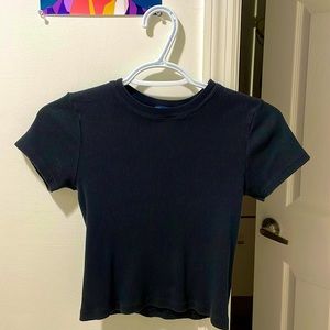 I’m selling an XS black brandy Melville shirt.